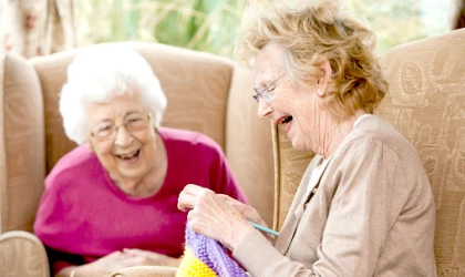 Ladies enjoying chat and knitting