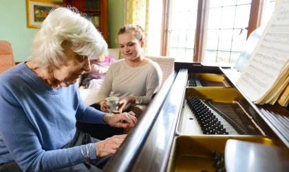 brooke house resident playing piano