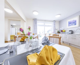 Take in the stunning view of the dining area at Highcliffe Luxury nursing home